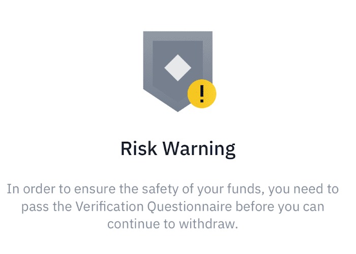 Binance 官方风控核验提示示例：继续提现前需完成核验问卷（2023年资料，非个案账户）